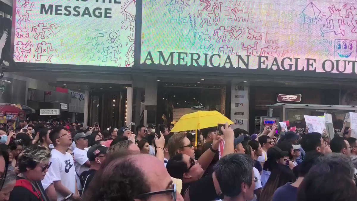 Hong Kongers' Beyond cover in New York's Times Square 