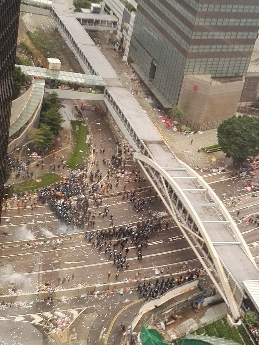 More tear gas has been fired on Harcourt Road, as police push through and clear protesters.