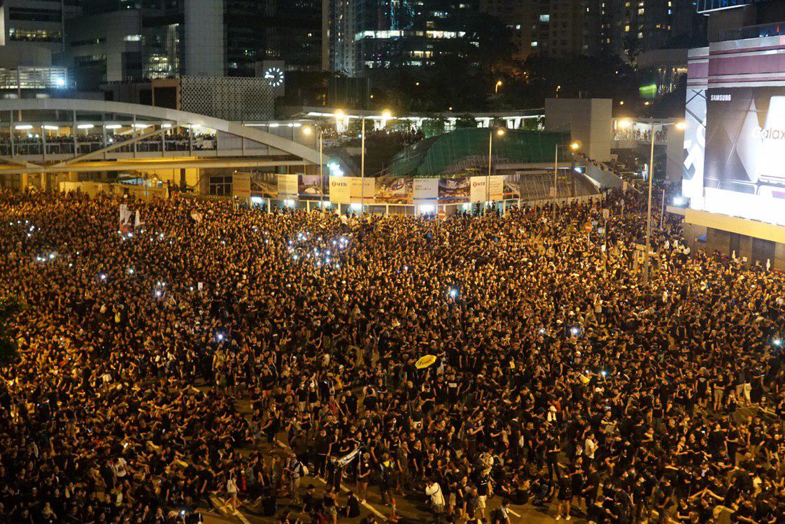 Organisers have announced a turnout estimate of close to two million, nearly doubling that of last Sunday's rally and making it the largest protest in Hong Kong's history. Police have yet to release their figure. 