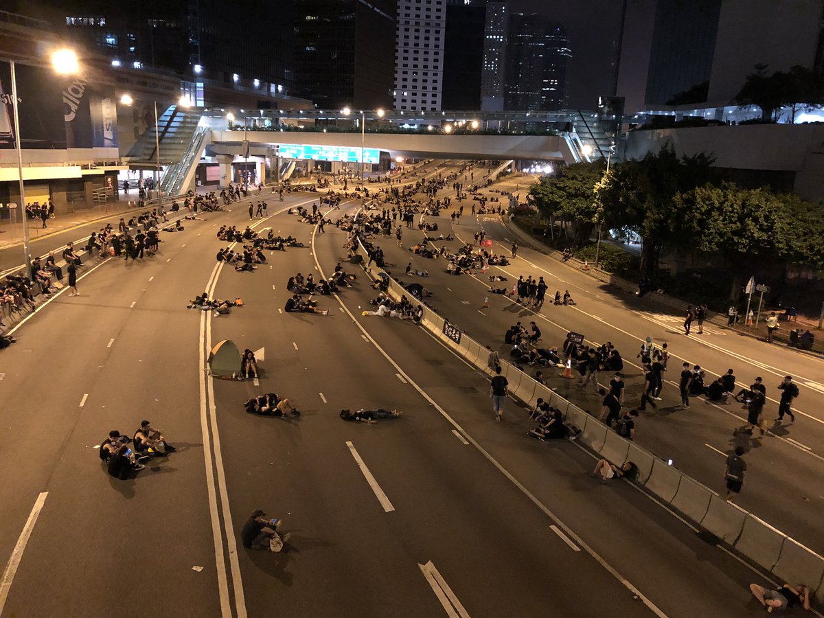 2:54am: Seems slightly emptier than before. Still lots of upbeat chatter, though many are trying to sleep. 