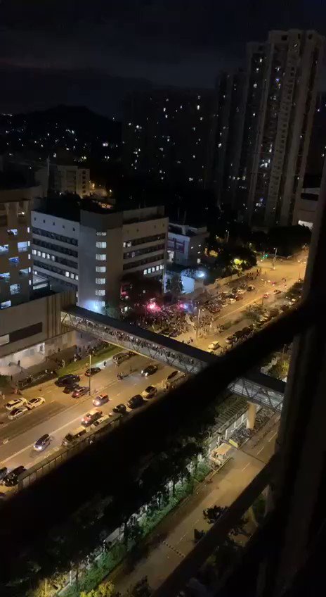 A car outside the Tin Shui Wai Police Station fired fireworks at the crowd. At least 10 people were injured