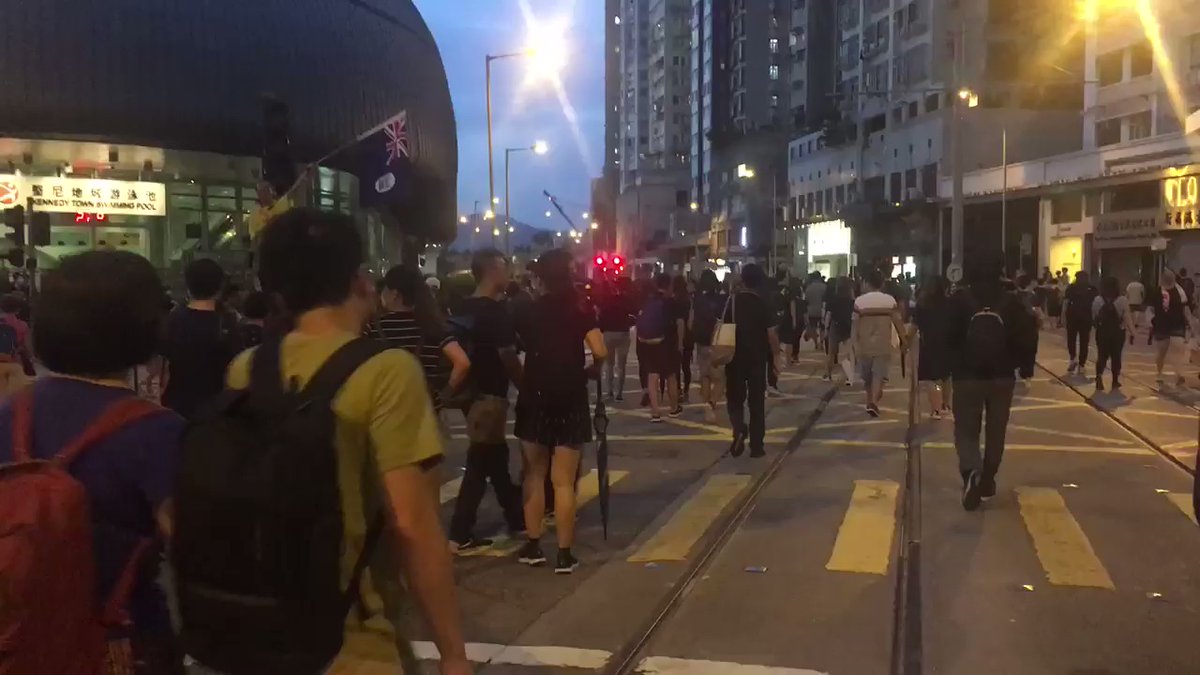 Protesters moving to the Liaison Office from Kennedy Town