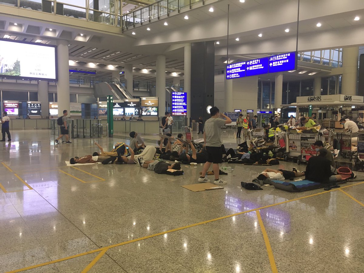 The small group of protesters still at the airport