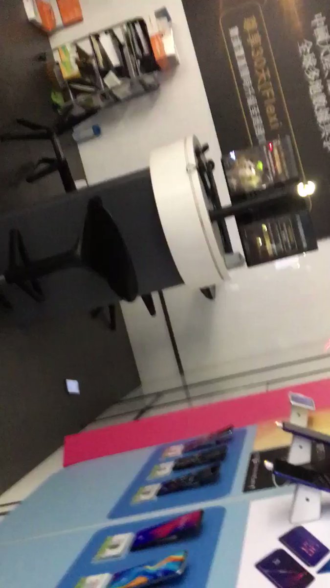 Scene inside the China Mobile store in CWB - store trashed and glass broken