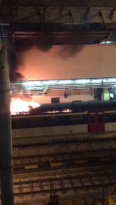 Fire burning on top of a train in Kowloon Tong