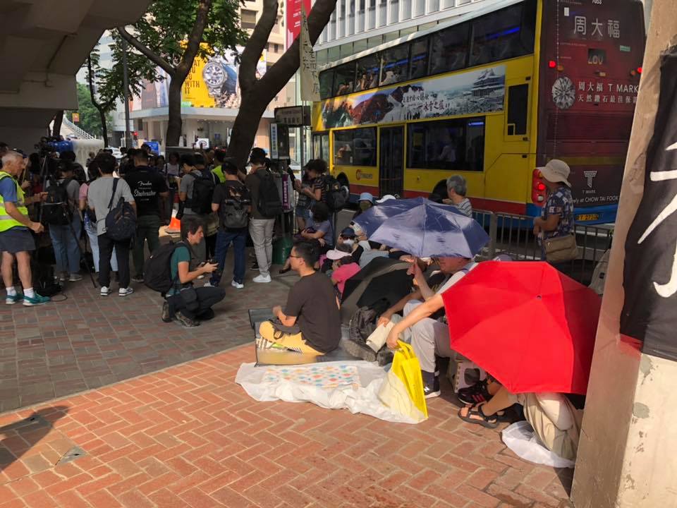 A group of elderly protesters commenced a 48-hour sit-in outside Wanchai's Police Headquarters on Saturday against police brutality, targeting of young people, and calling for an independent investigation into the force.  Photo: 銀髮族老而不廢  