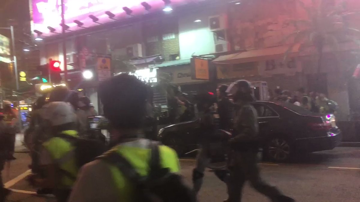 Riot police out to disperse crowd outside Mongkok Police Station now
