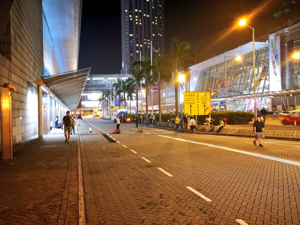 The entrance to the airport express is blocked to traffic by makeshift barriers