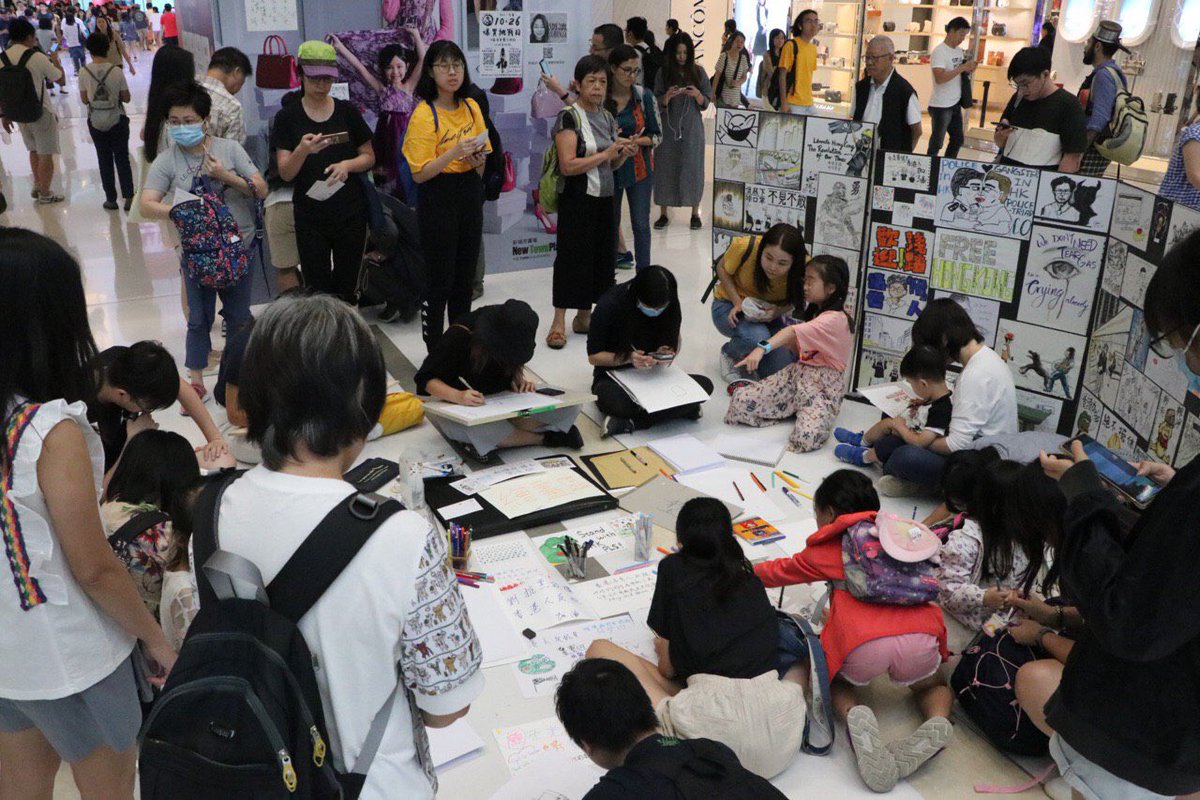 Protesters rallied in a family-friendly event at Shatin's New Town Plaza on Saturday afternoon, to call for a boycott of pro-Beijing businesses and restaurants. Photo: InMedia. 