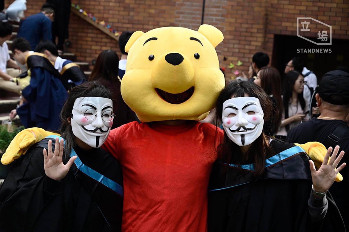 HongKong students donned Guy Fawkes masks and Pooh costumes for their graduation ceremony at Polytechnic University today. Photos from @StandNewsHK