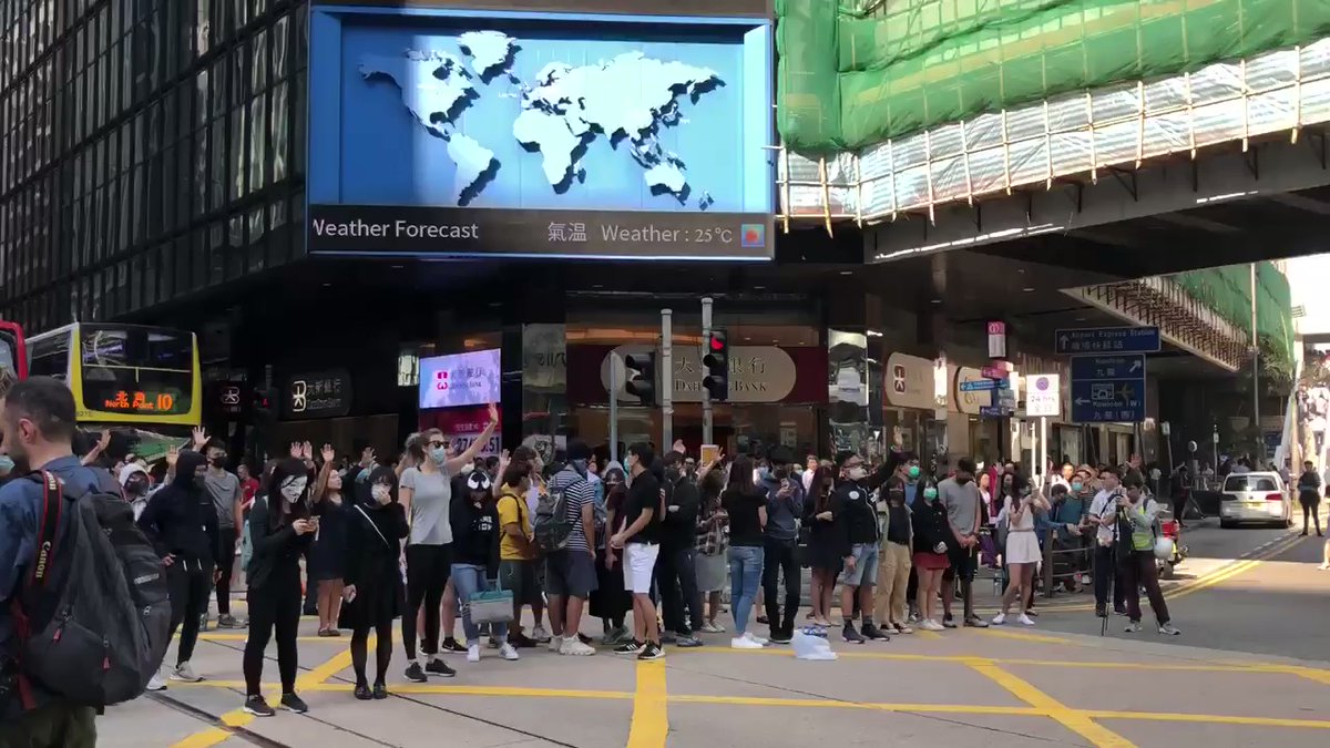 Around a hundred HongKong protesters have occupied the junction of Pedder Street &Des Voeux Road Central,in a flash mob style protest to mourn the death of the UST student. Traffic is paralysed. They chanted Hong Kongers, take revenge. Disband @hkpoliceforce  #HongKongProtests