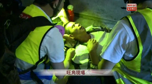 This man was pepper-sprayed just   in MongKok as Hong Kong Police are   clearing the area. Other witnesses say he's drunk. Officers were heard yelling There was much warning given in the background.
