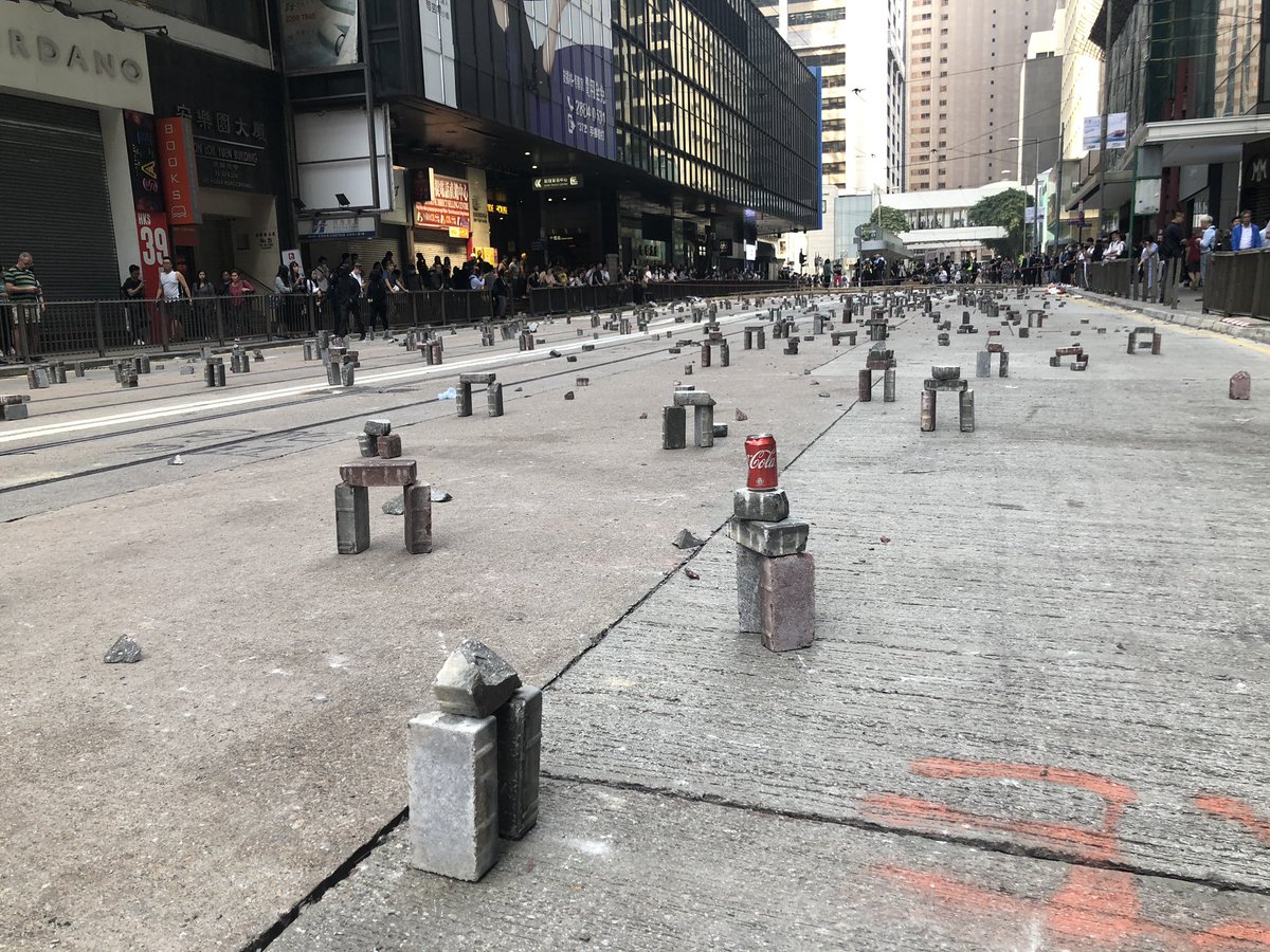 Bricks and road blocks on Des Voeux Rd West