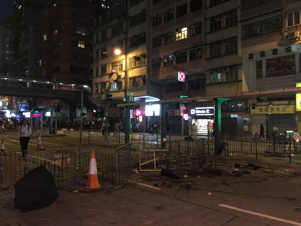 The centre of Sai Wan Ho, where police shot a protester on Monday morning, still looks a bit like a war zone tonight 
