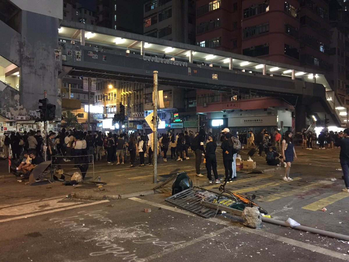 The centre of Sai Wan Ho, where police shot a protester on Monday morning, still looks a bit like a war zone tonight 